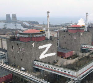 An image of the Zaporizha Nuclear Power plant with a "Z" graffitied onto the side of the building